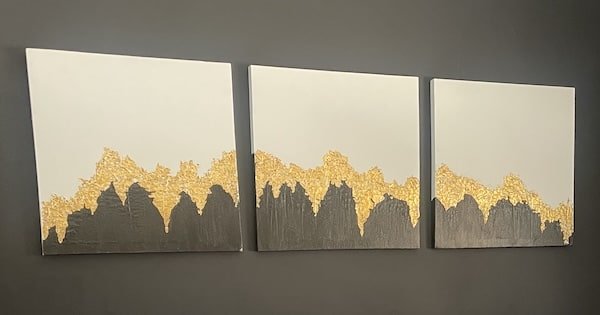 three diy paintings that are supposed to be black white and gold abstract mountains