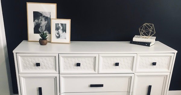 old wood dresser refinished with white paint and black hardware