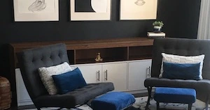 old wood dresser refinished with white paint and black hardware