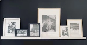old wood dresser refinished with white paint and black hardware