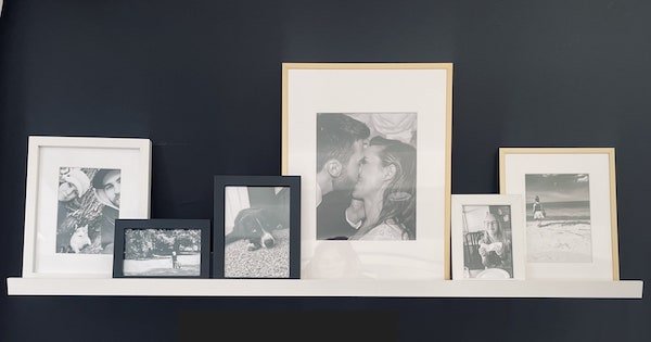 old wood dresser refinished with white paint and black hardware