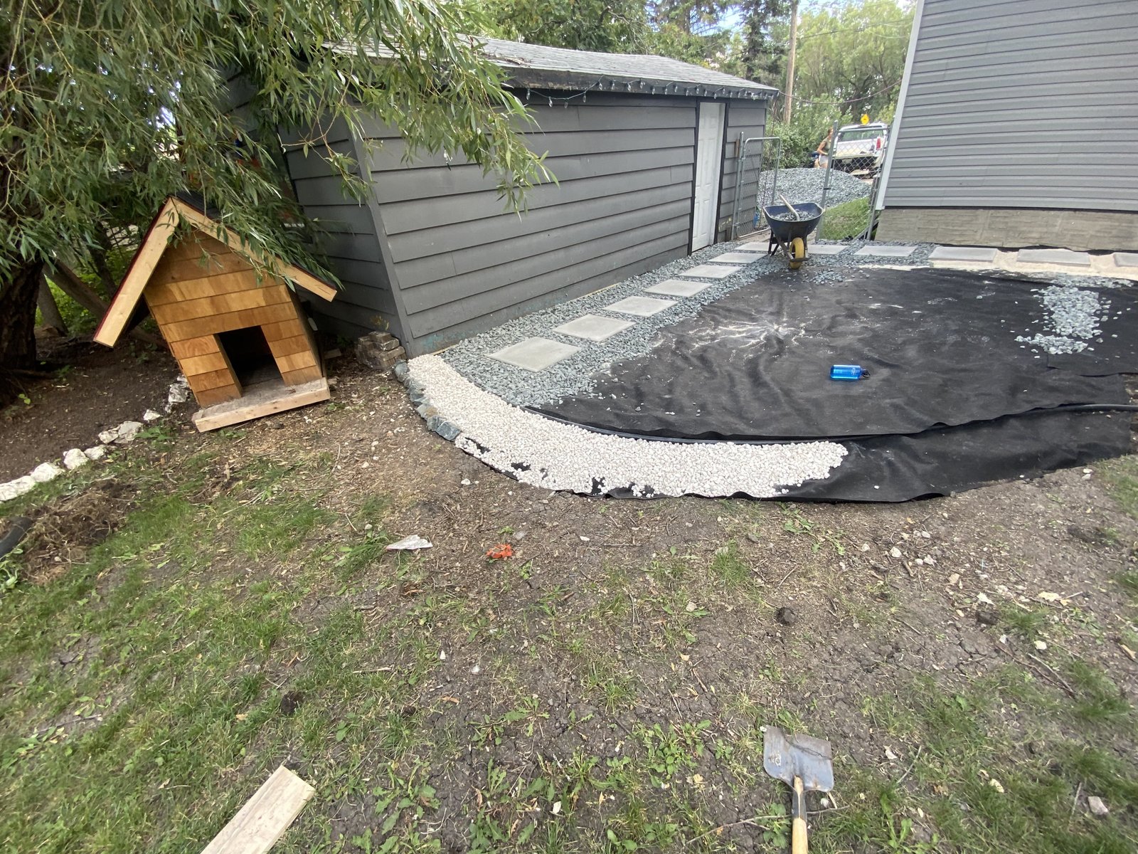 black and white limestone and granite diy patio being made
