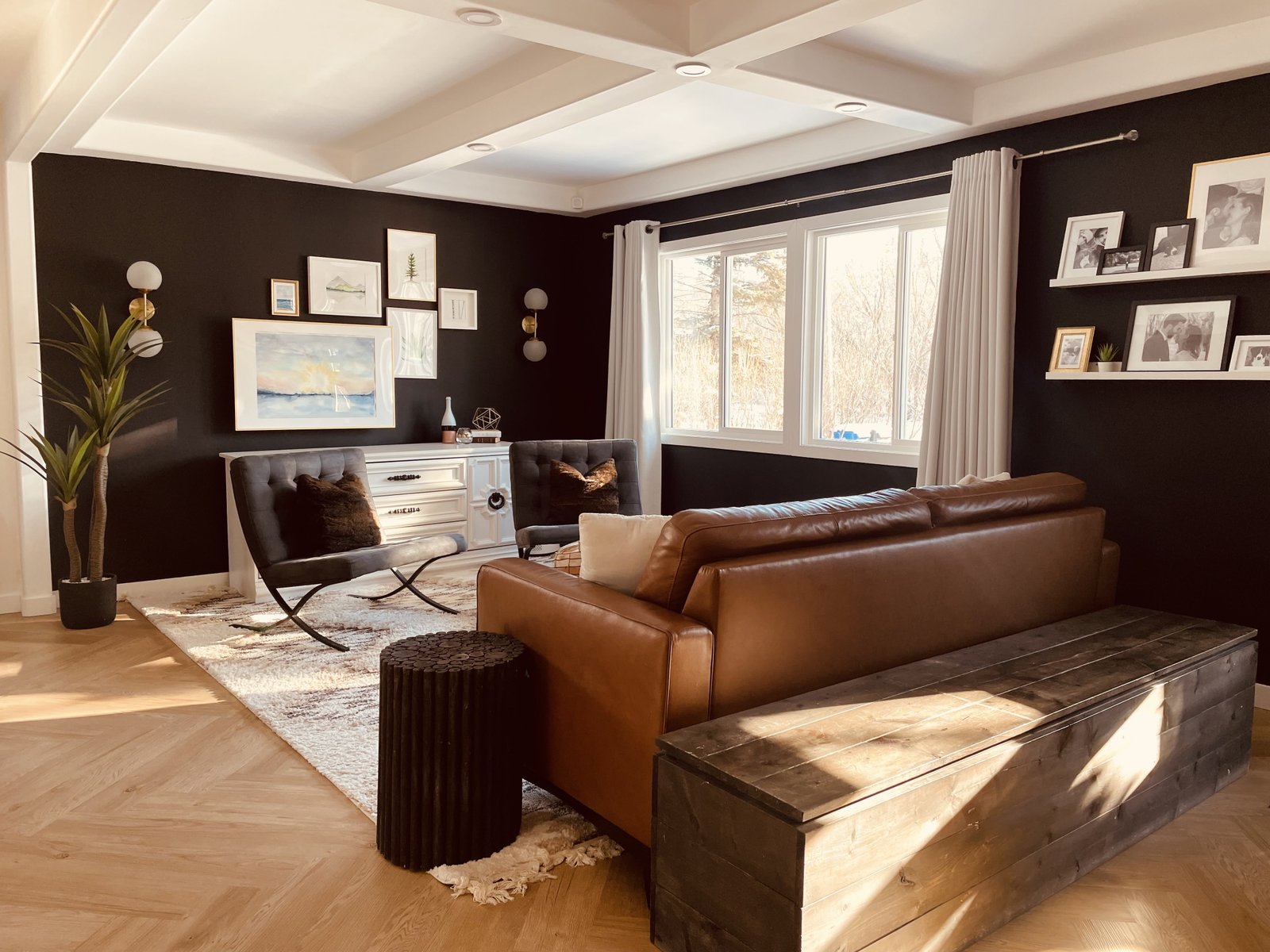 cozy open concept living room with a refinished credenza for toy storage
