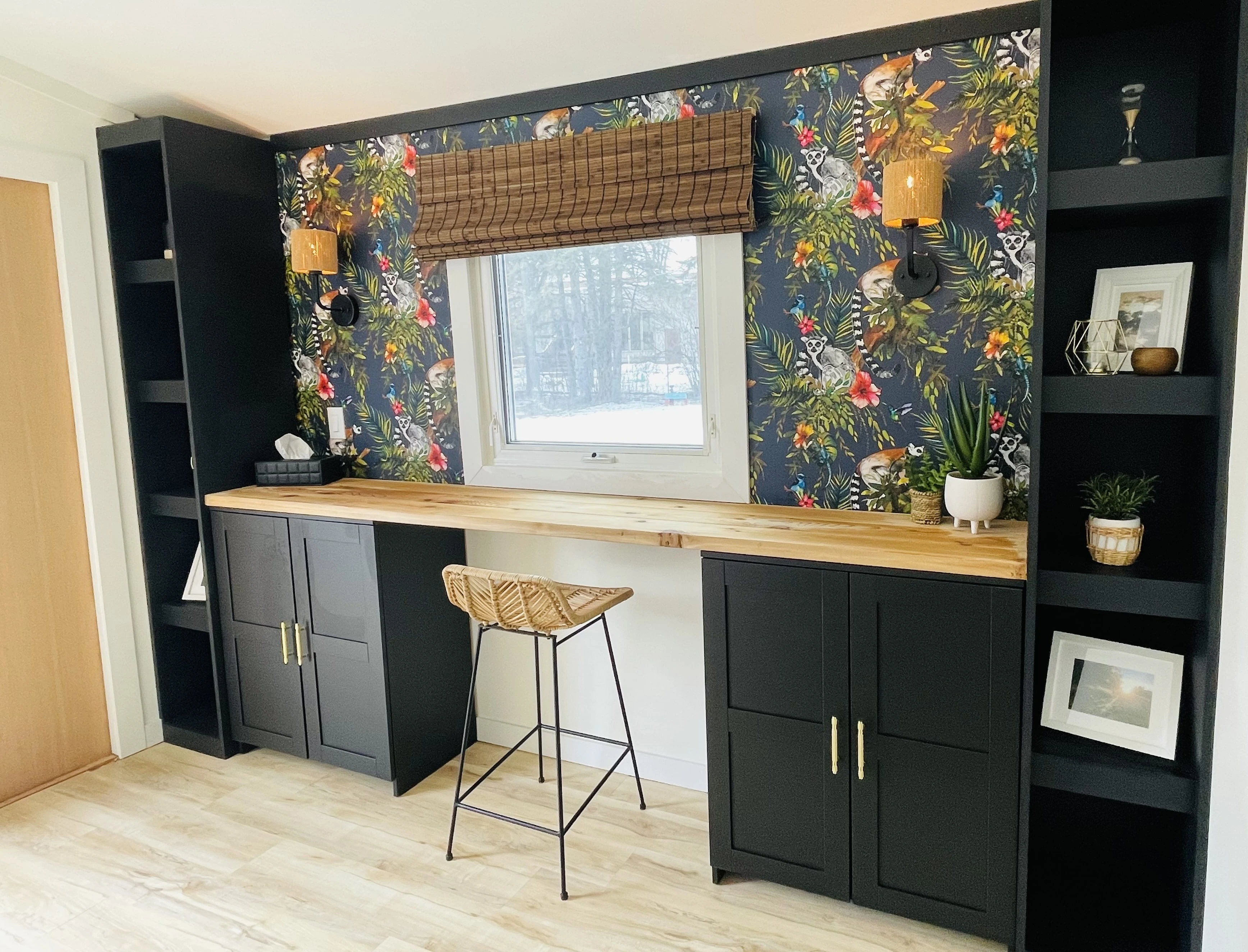 built in wall with custom book cases, ikea brimnes cabinets and a wood plank desktop