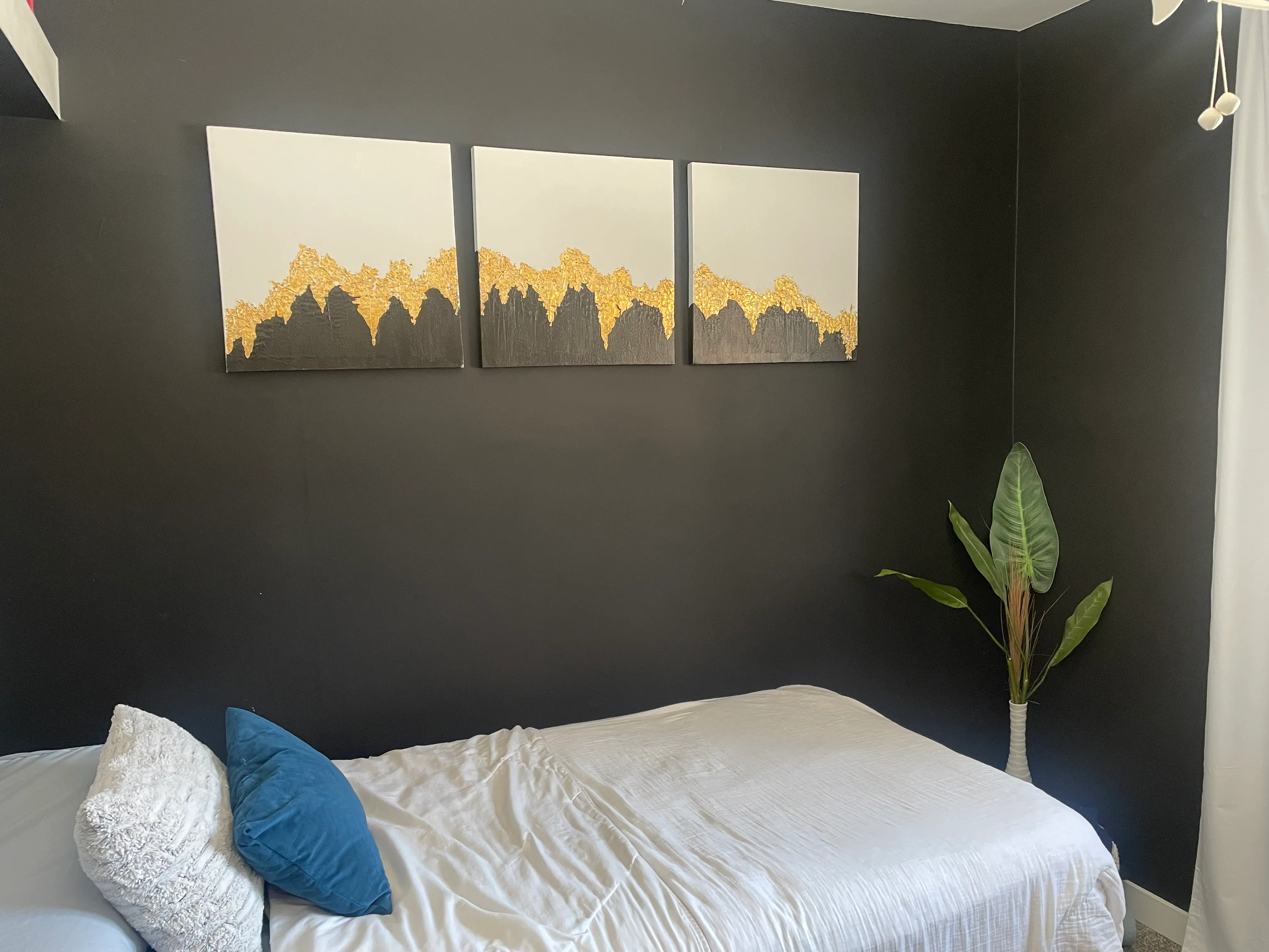set of three paintings white and black with gold abstract mountains