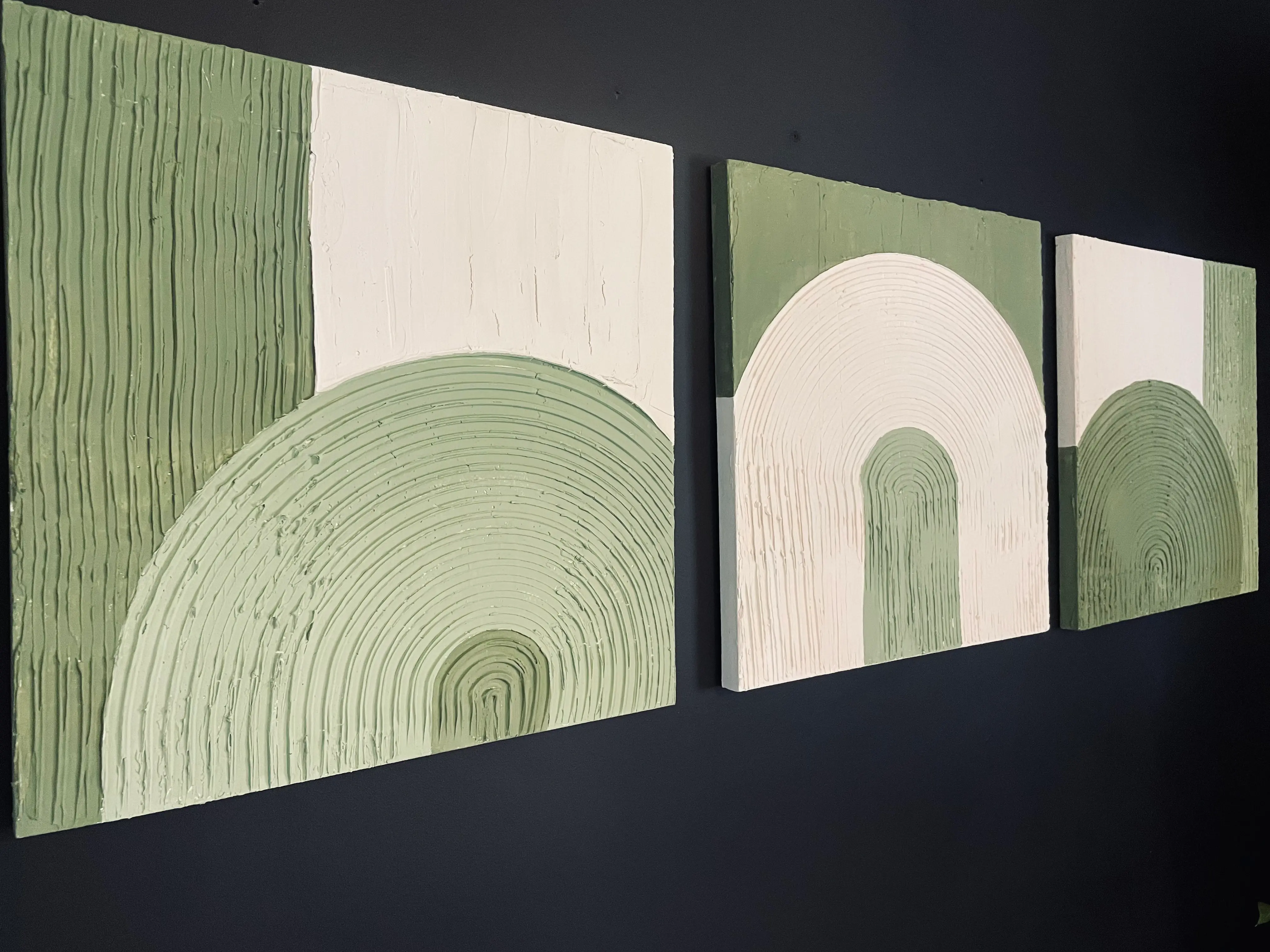 set of three green and beige texture paintings